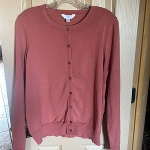 Salmon colored cardigan sweater